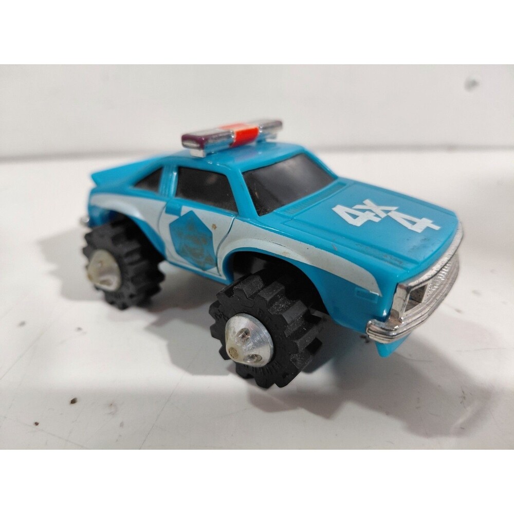LJN Rough Rider 4x4 Battery Operated Blue & White Police Car